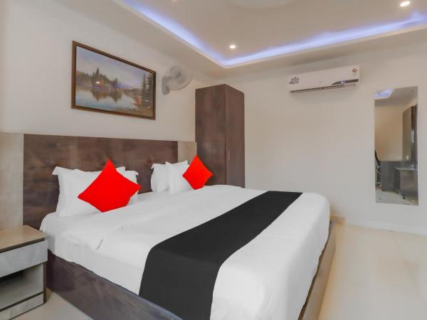 Capital O Hotel Royal Galaxy Finesse Near Phoenix Marketcity : photo 4 de la chambre chambre triple confort avec douche