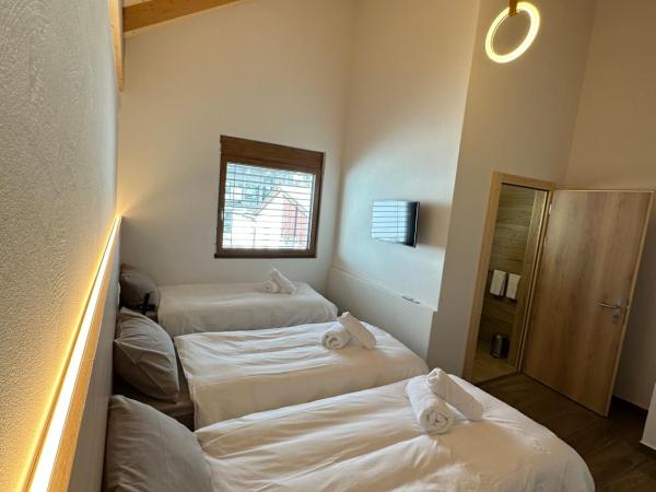 Maison des Sports : photo 2 de la chambre chambre triple