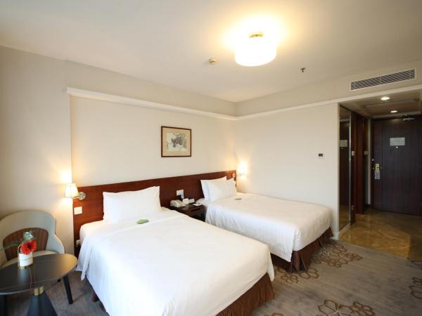 Liuhua Hotel : photo 3 de la chambre chambre lits jumeaux standard