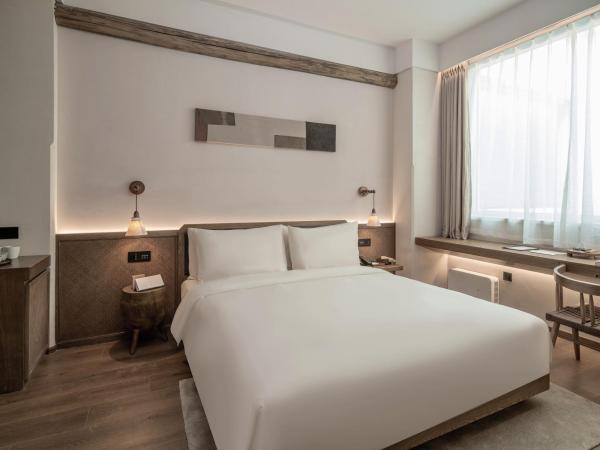 Sahe Hotel Shanghai World Expo : photo 1 de la chambre double room with courtyard