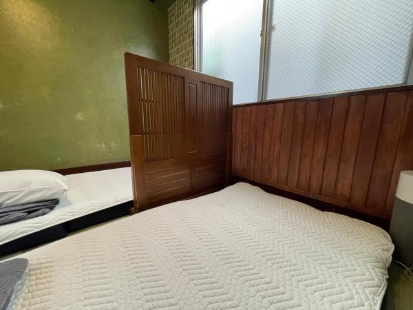 Guest House Shinagawa-shuku : photo 1 de la chambre chambre lits jumeaux avec salle de bains commune