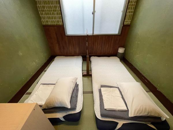 Guest House Shinagawa-shuku : photo 3 de la chambre chambre lits jumeaux avec salle de bains commune