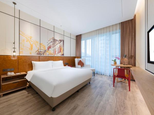 KARE HOTELS RESIDENCES Qianhai Shenzhen : photo 1 de la chambre chambre supérieure lit queen-size