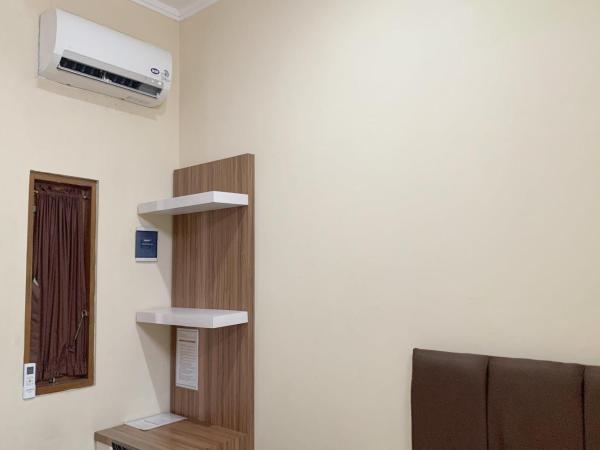 Residence 21 Syariah : photo 6 de la chambre chambre double standard