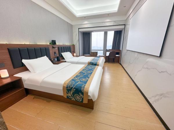 Xingyin Cloudy Hotel Guangzhou Changgang Subway Station - Free Shuttle Bus to Canton Fair Complex During Canton Fair Period : photo 6 de la chambre chambre lits jumeaux - vue sur ville
