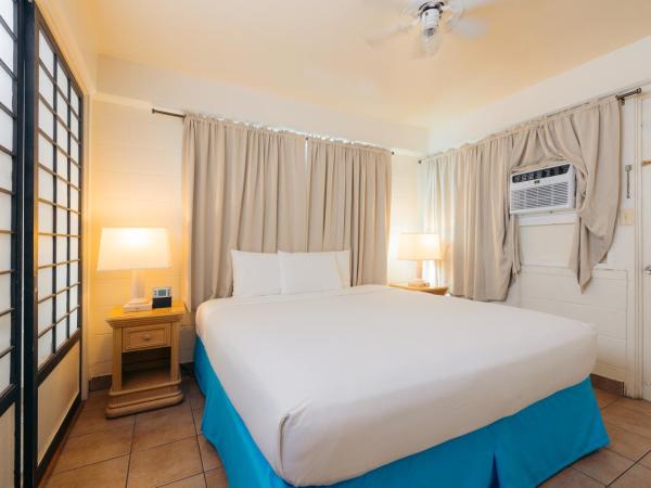 Waikiki Heritage Hotel : photo 2 de la chambre suite 1 chambre lit king-size avec canapé-lit