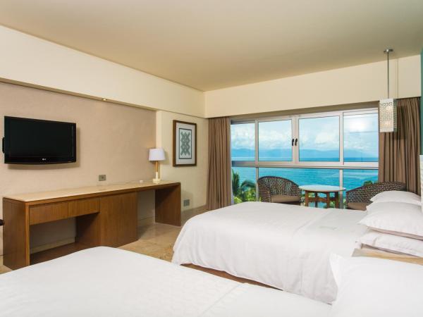 Sheraton Buganvilias Resort & Convention Center : photo 3 de la chambre chambre deluxe avec 2 lits doubles - vue sur océan - Étage intermédiaire