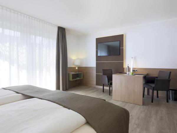 Lindner Hotel Dusseldorf Airport, part of JdV by Hyatt : photo 1 de la chambre chambre lit king-size premium