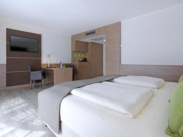 Lindner Hotel Dusseldorf Airport, part of JdV by Hyatt : photo 2 de la chambre chambre lit king-size premium
