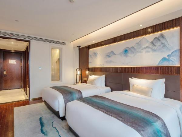 New Century Hotel Qianchao Hangzhou : photo 5 de la chambre chambre lits jumeaux deluxe