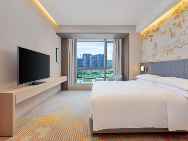 Hilton Garden Inn Suzhou Wuzhong : photo 2 de la chambre suite deluxe avec lit king-size