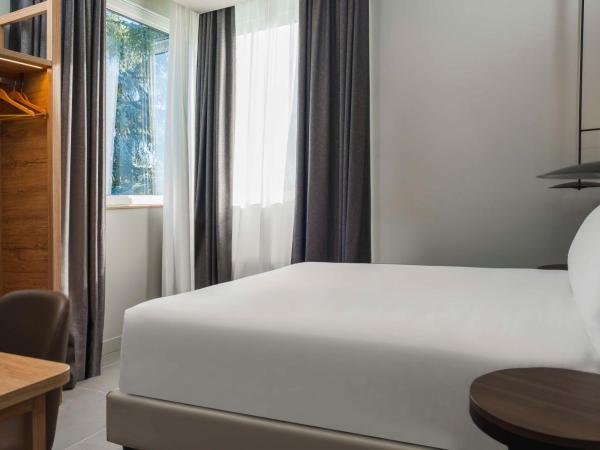 Hilton Garden Inn Bologna North : photo 3 de la chambre suite 2 chambres avec lit king-size