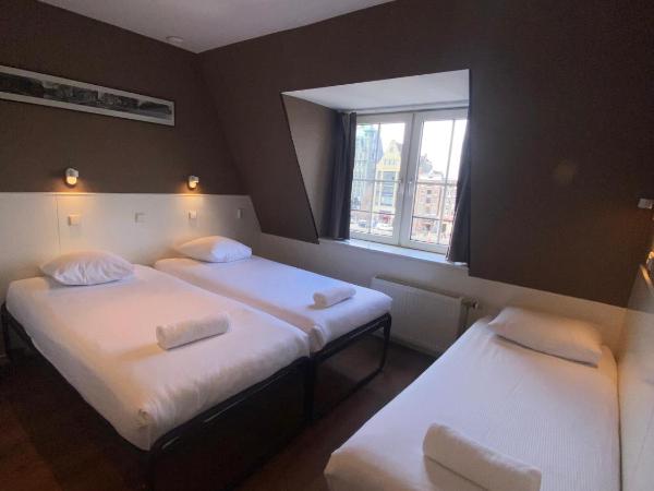 Hotel Old Quarter : photo 6 de la chambre chambre triple - vue sur canal