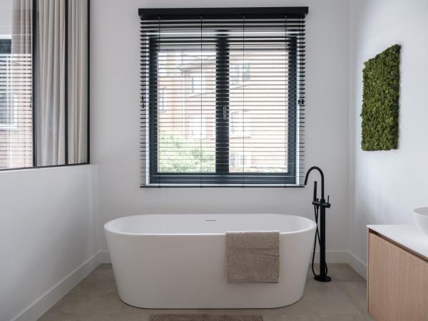 B&B The Four : photo 1 de la chambre chambre double deluxe avec baignoire