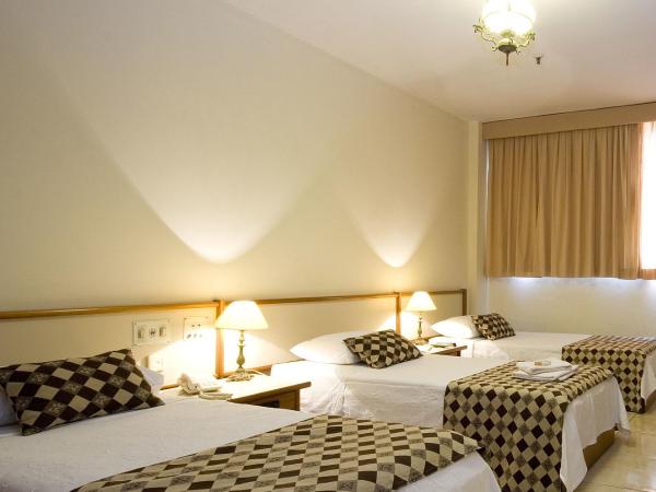 Hotel Rondônia Palace : photo 3 de la chambre chambre triple standard