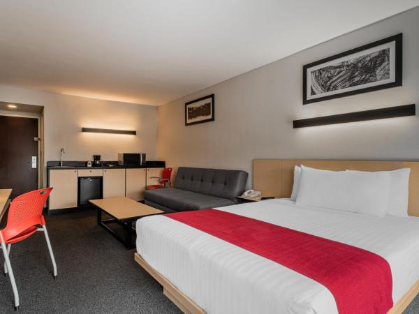 City Express by Marriott Queretaro Jurica : photo 4 de la chambre chambre lit queen-size supérieure avec canapé-lit