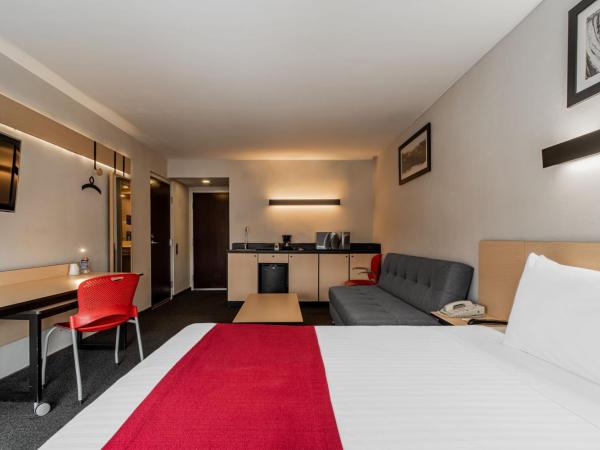 City Express by Marriott Queretaro Jurica : photo 6 de la chambre chambre lit queen-size supérieure avec canapé-lit