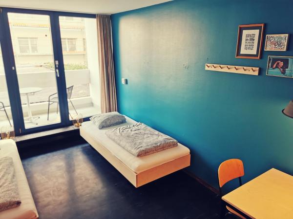 Backpackers Luzern : photo 6 de la chambre chambre lits jumeaux Économique avec salle de bains commune