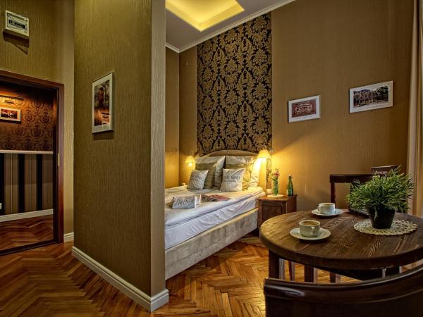 Stare Kino Cinema Residence : photo 8 de la chambre appartement avec lit double