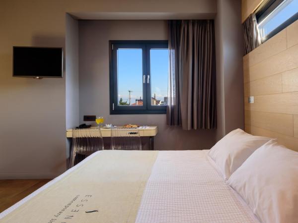 Essence Hotel : photo 6 de la chambre elegant triple room with city view
