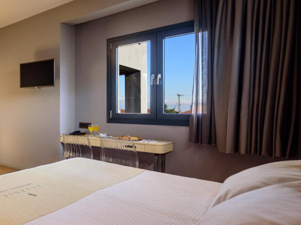 Essence Hotel : photo 8 de la chambre elegant triple room with city view