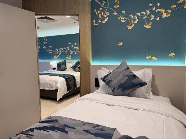 Yixuan Yasi Apartment-free shuttle during the Canton Fari : photo 2 de la chambre suite familiale