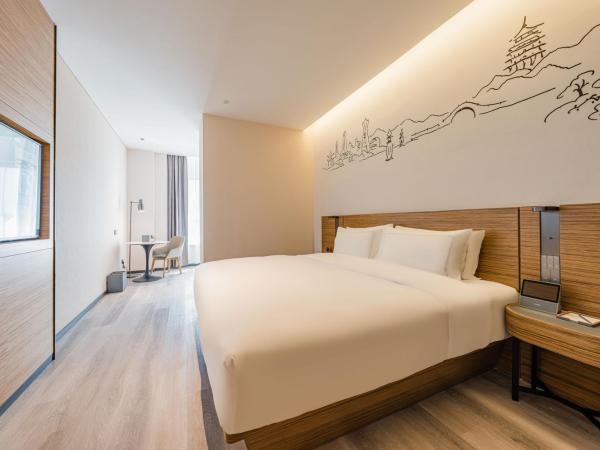 UrCove by HYATT Hangzhou Riverside CBD : photo 2 de la chambre chambre lit king-size exécutive