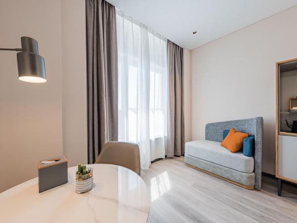 UrCove by HYATT Hangzhou Riverside CBD : photo 3 de la chambre chambre lit king-size exécutive