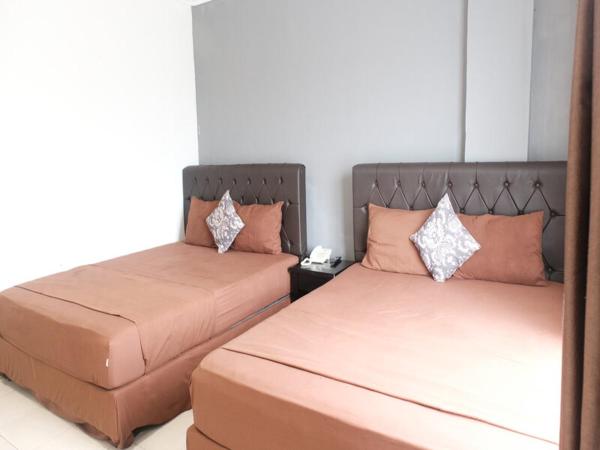 Pasifik Hotel Jakarta : photo 2 de la chambre chambre familiale