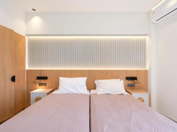 Arocaria Apartments : photo 7 de la chambre chambre lits jumeaux deluxe - vue sur mer