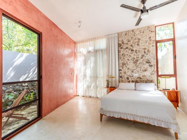 Casa Tuch. Suites independientes de diseño. Retiro de lujo, oasis de paz. : photo 8 de la chambre chambre double deluxe avec balcon