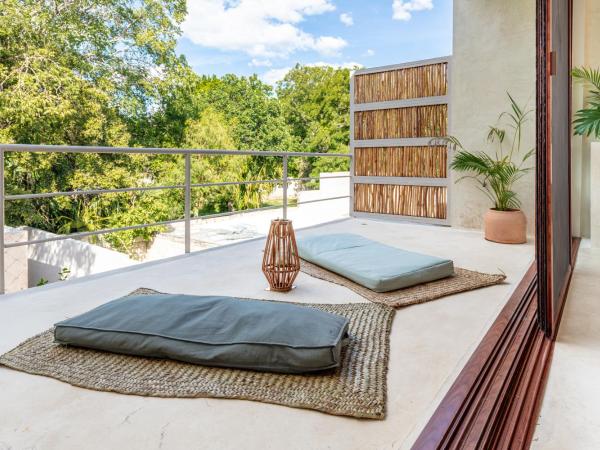 Casa Tuch. Suites independientes de diseño. Retiro de lujo, oasis de paz. : photo 4 de la chambre chambre double deluxe avec balcon