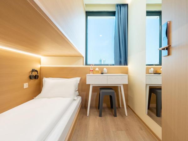 Lemon Hotel - Metro Line 1 Line 7 Changshu Road 200 meters : photo 9 de la chambre z scenic view single room - lower bunk  shared bathroom