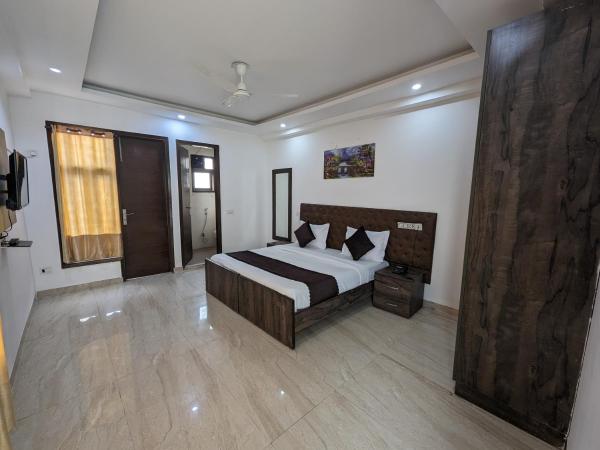 Flotel Residency Nearby Qutub Minar : photo 1 de la chambre chambre familiale supérieure