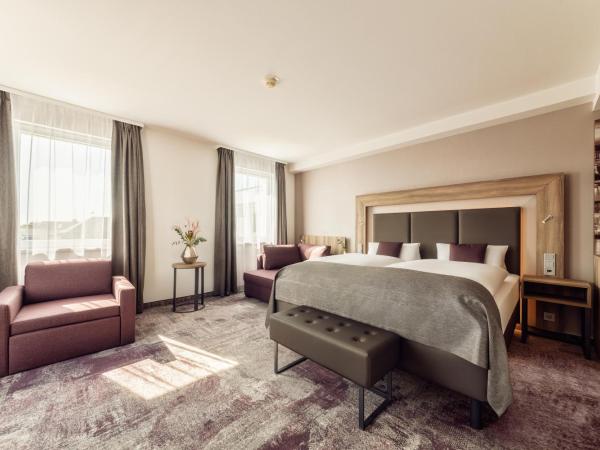 CityClass Hotel am Dom : photo 5 de la chambre suite junior avec terrasse - vue sur cathédrale