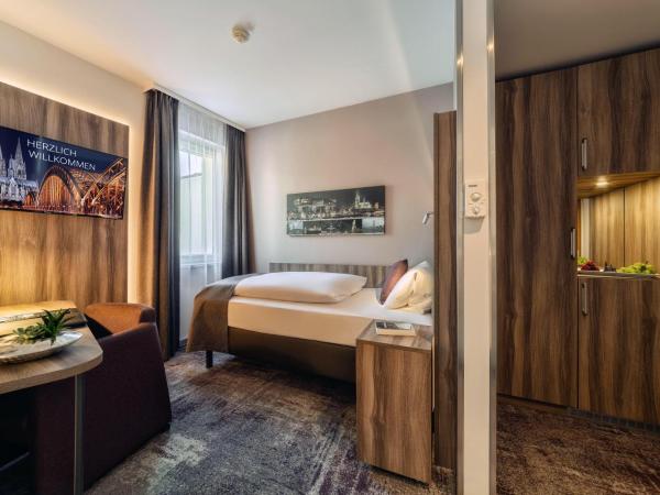 CityClass Hotel am Dom : photo 1 de la chambre chambre simple supérieure - vue sur cathédrale