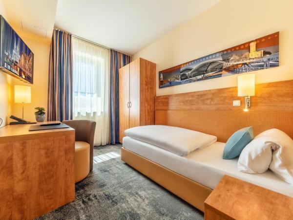 CityClass Hotel am Dom : photo 3 de la chambre chambre simple confort