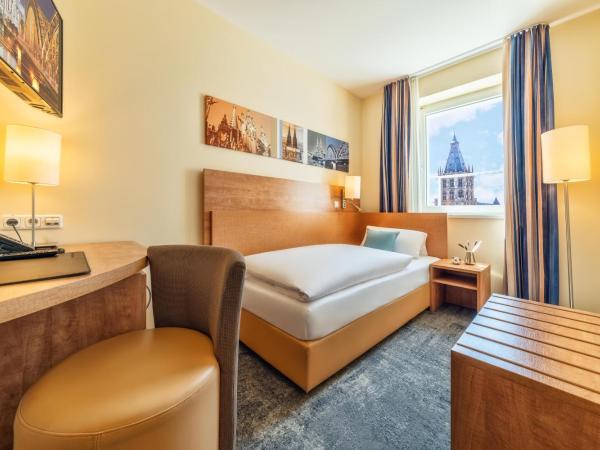 CityClass Hotel am Dom : photo 1 de la chambre chambre simple confort