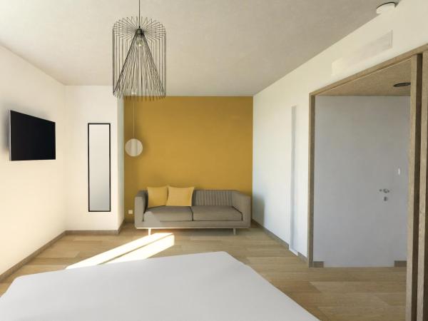 voco Beaune, an IHG Hotel : photo 2 de la chambre super premium king room with sofa bed and garden view