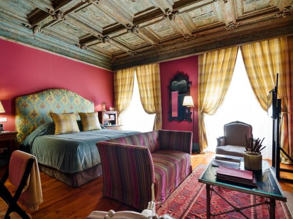 M Maison Particulière Porto : photo 1 de la chambre suite - vue sur ville