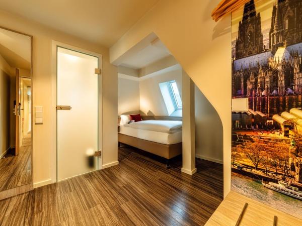 CityClass Hotel am Heumarkt : photo 5 de la chambre chambre familiale