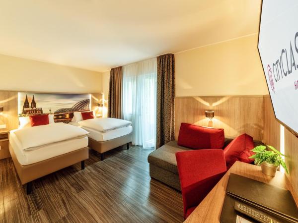 CityClass Hotel am Heumarkt : photo 1 de la chambre chambre lits jumeaux supérieure