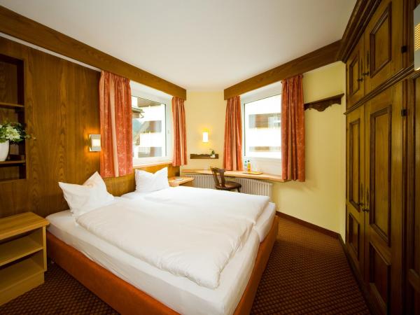 Le Petit CHARME-INN : photo 1 de la chambre chambre lits jumeaux