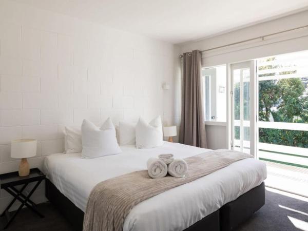 Stay Coastal - Apartments : photo 2 de la chambre appartement avec balcon