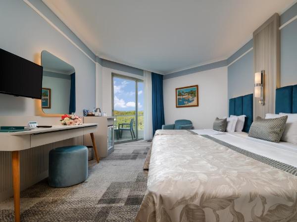 Pine Beach Belek : photo 1 de la chambre chambre double ou lits jumeaux standard - vue sur jardin