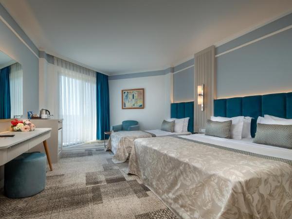 Pine Beach Belek : photo 4 de la chambre chambre double ou lits jumeaux - vue sur jardin