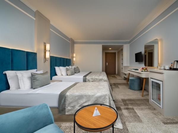 Pine Beach Belek : photo 2 de la chambre chambre double ou lits jumeaux standard - vue sur jardin