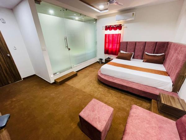 Hotel Nova Blue : photo 9 de la chambre suite lit king-size avec baignoire spa