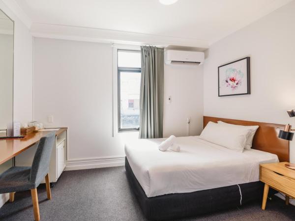 Newtown Cozy Stays : photo 1 de la chambre chambre double avec salle de bains privative