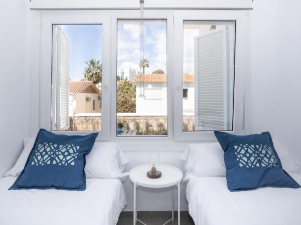 San Miguel 34 Rooms : photo 2 de la chambre chambre lits jumeaux avec salle de bains commune